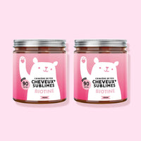 Image du pack de 2 pots de 90 gummies Cheveux Sublimes Biotine de Bears with Benefits (2 x 90 unités), formule vegan, visuel duo de pots sur fond rose. l Bears with Benefits